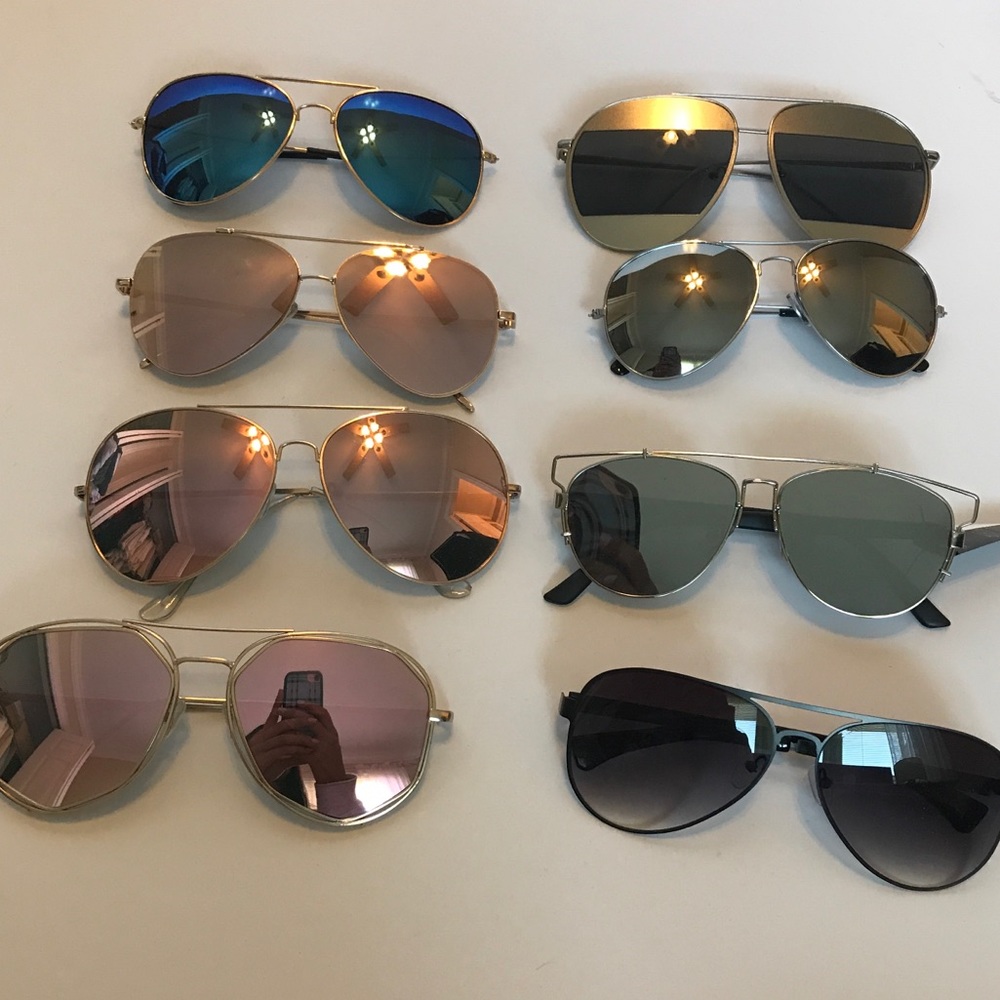 8 pairs of sunglasses